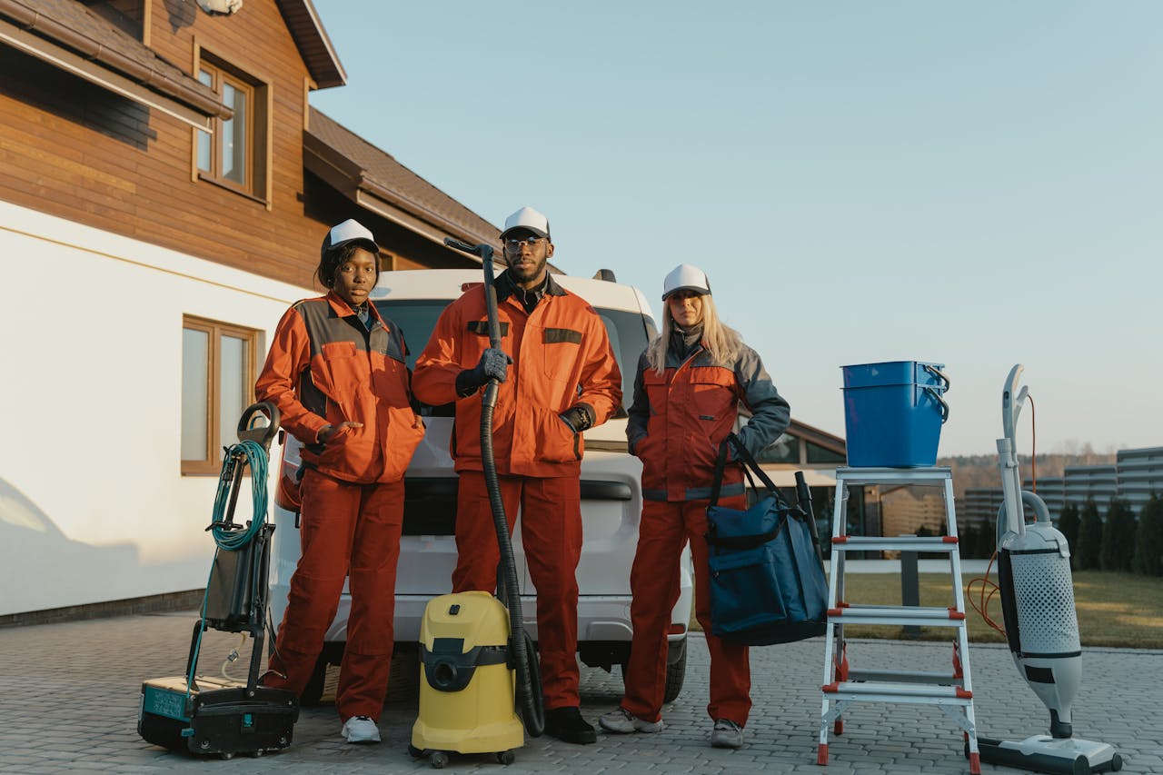 Mastering the First Impression: Your intriguing post title goes here Group of workers in protective gear standing beside equipment outdoors.